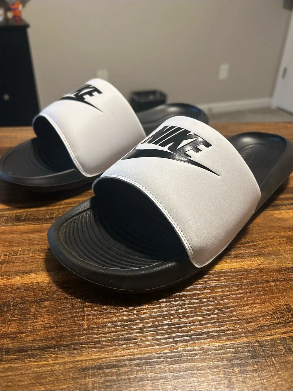 Nike Black and White Slide Sandals with Logo Strap